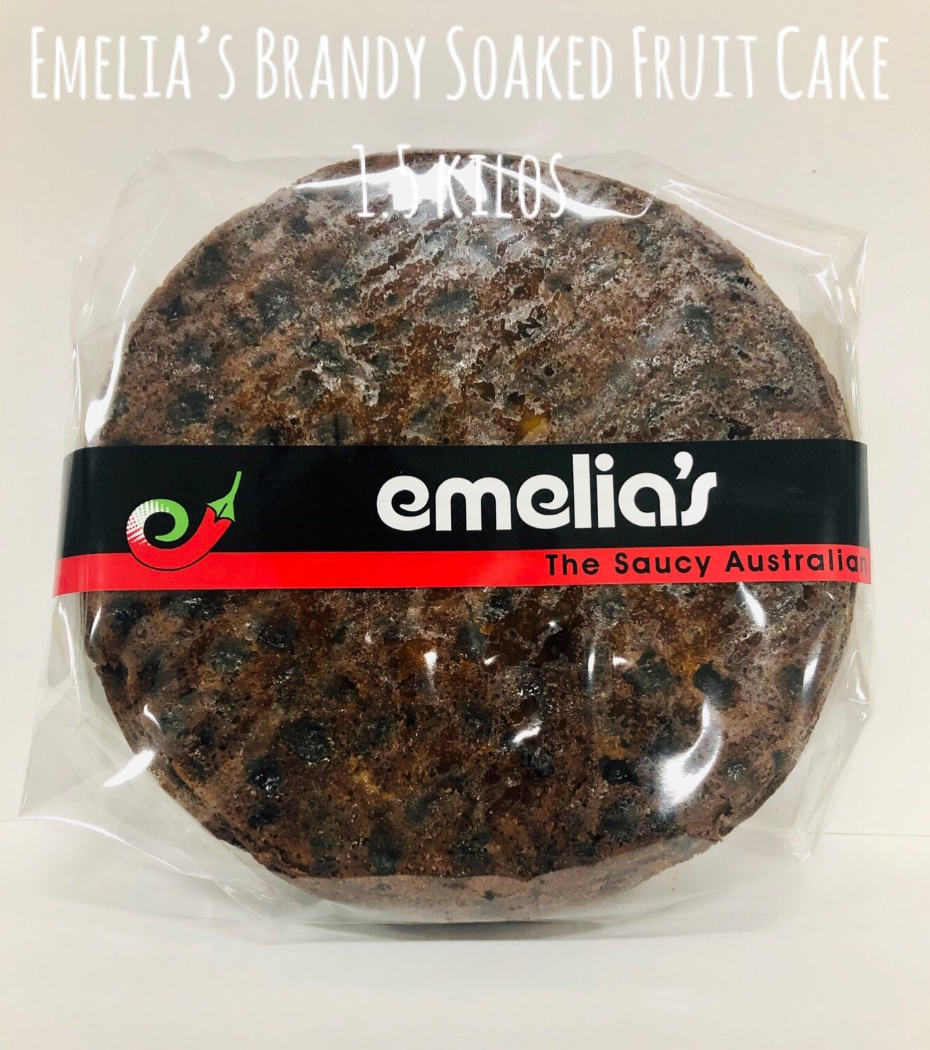 Emelia’s large 1.5kg traditional fruit cake, slow-matured with brandy-soaked fruits for a festive dessert.