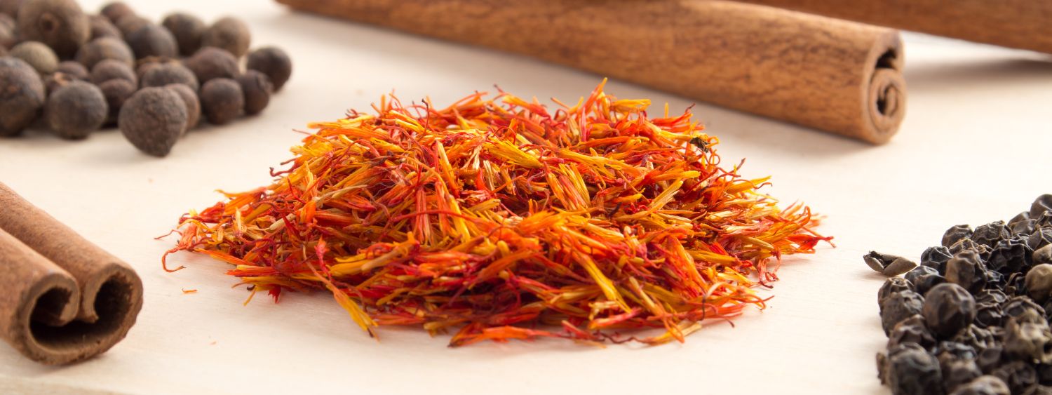 Zest peel with cinnamon sticks and currents on a flat surface