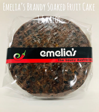 Emelia’s large 1.5kg traditional fruit cake, slow-matured with brandy-soaked fruits for a festive dessert.