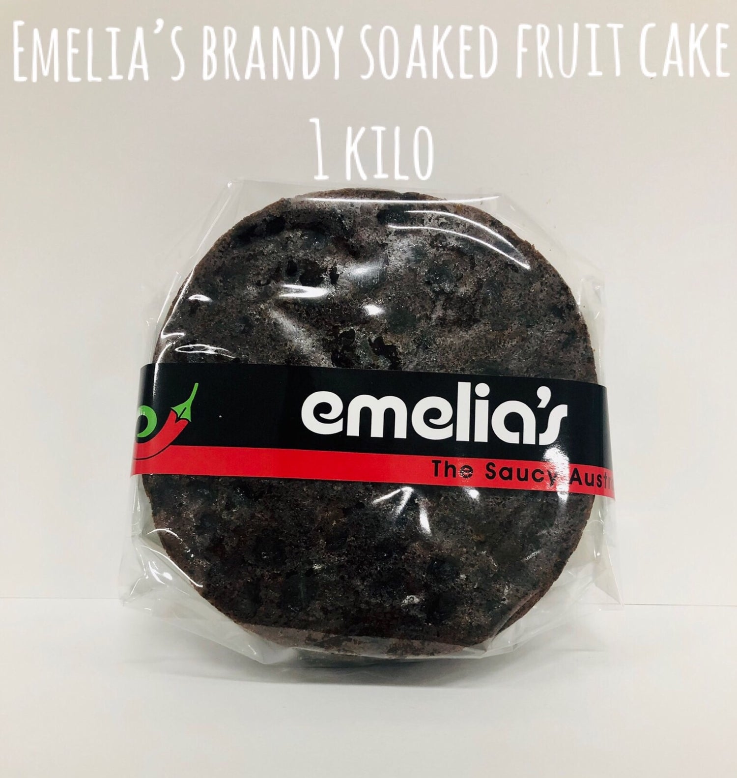 Emelia’s 1kg traditional Christmas fruit cake, packed with brandy-soaked fruit and perfect for sharing.