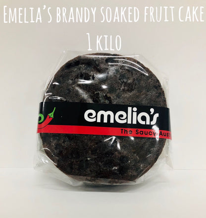 Emelia’s 1kg traditional Christmas fruit cake, packed with brandy-soaked fruit and perfect for sharing.