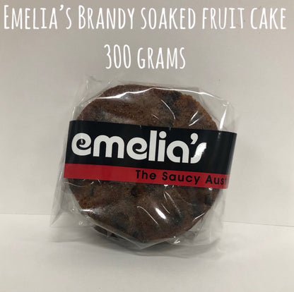 Emelia’s The Saucy Australian 300g traditional fruit cake, rich with soaked fruits and served with warm custard.